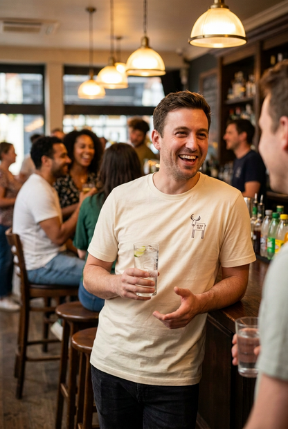 Person socialising in a bar laughing